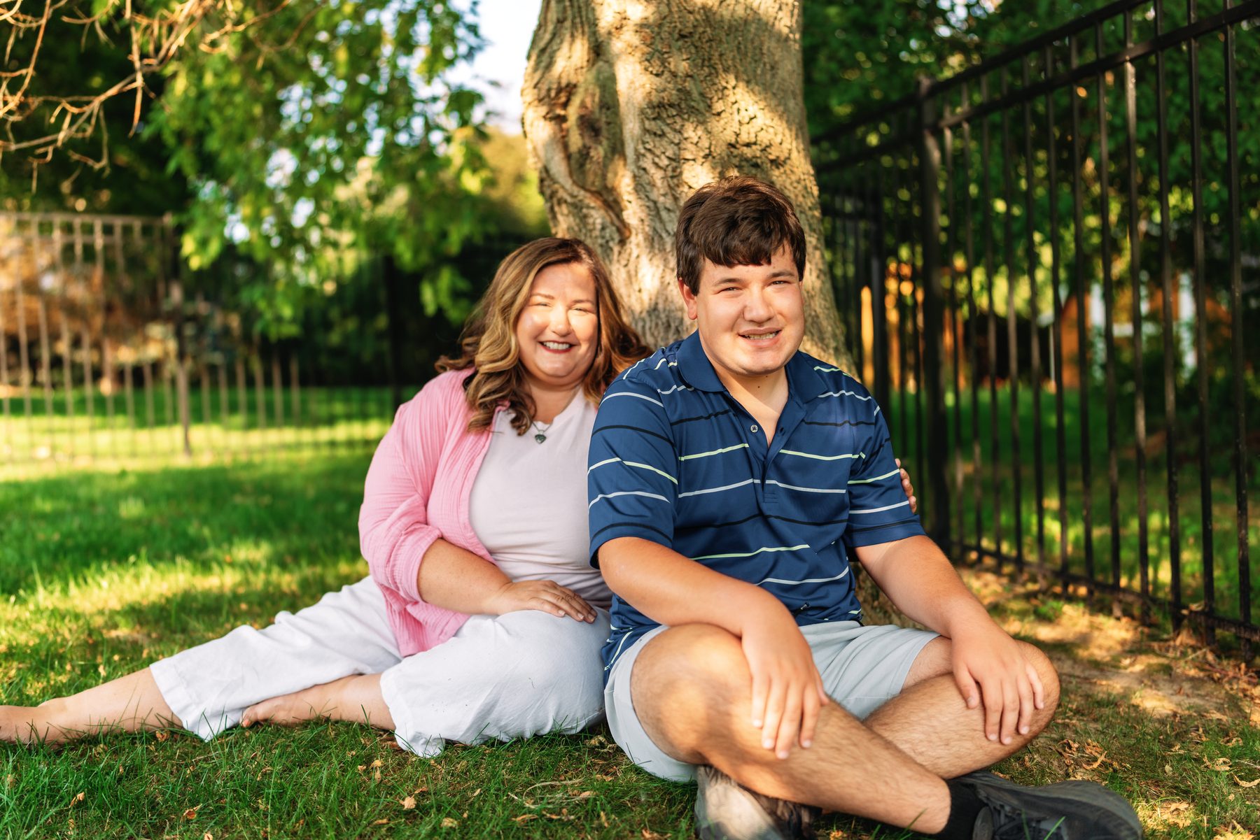 Mary Ann Morris and her son Luke sitting together outdoors
